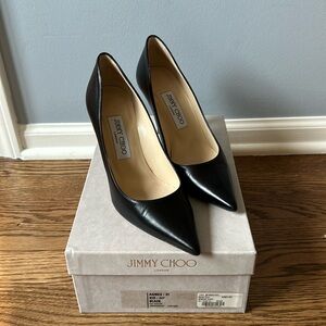 Jimmy choo black heals size 37. Only wore 2 times. Still have box.
